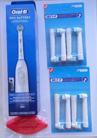 Электрическая зубная щетка Oral-B белая 3750 фото