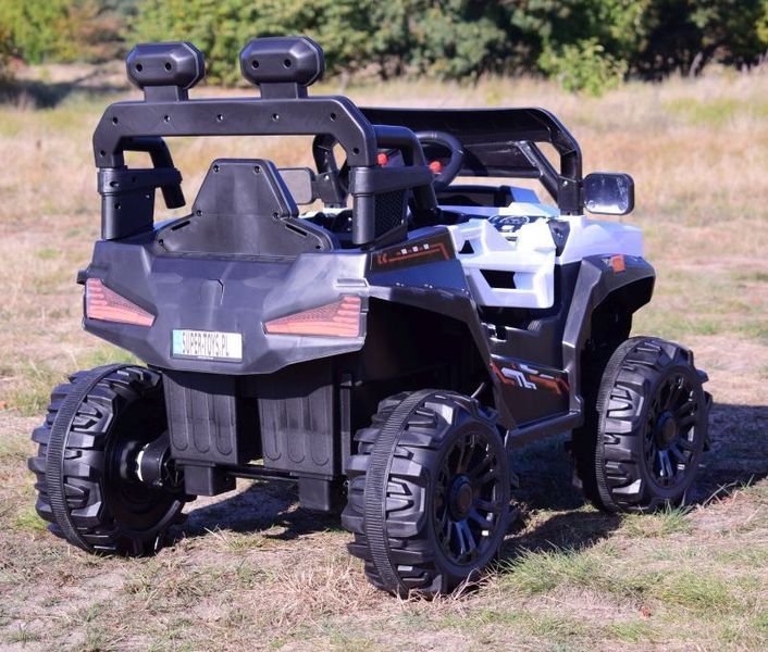 Спортивная багги внедорожник бело-черный на радиоуправлении с 1 до 8 лет 999 фото