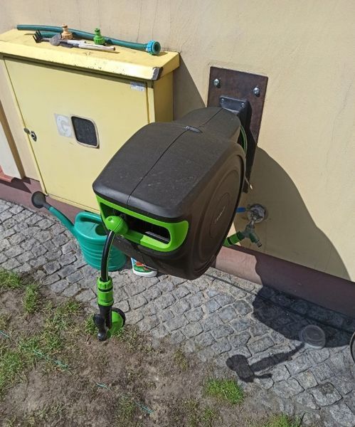 Садовий шланг з автоматичною котушкою 30 м та розбризкувачем 7 режимів 27506 фото